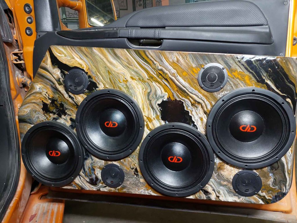Interior of car door with orange marbled paint